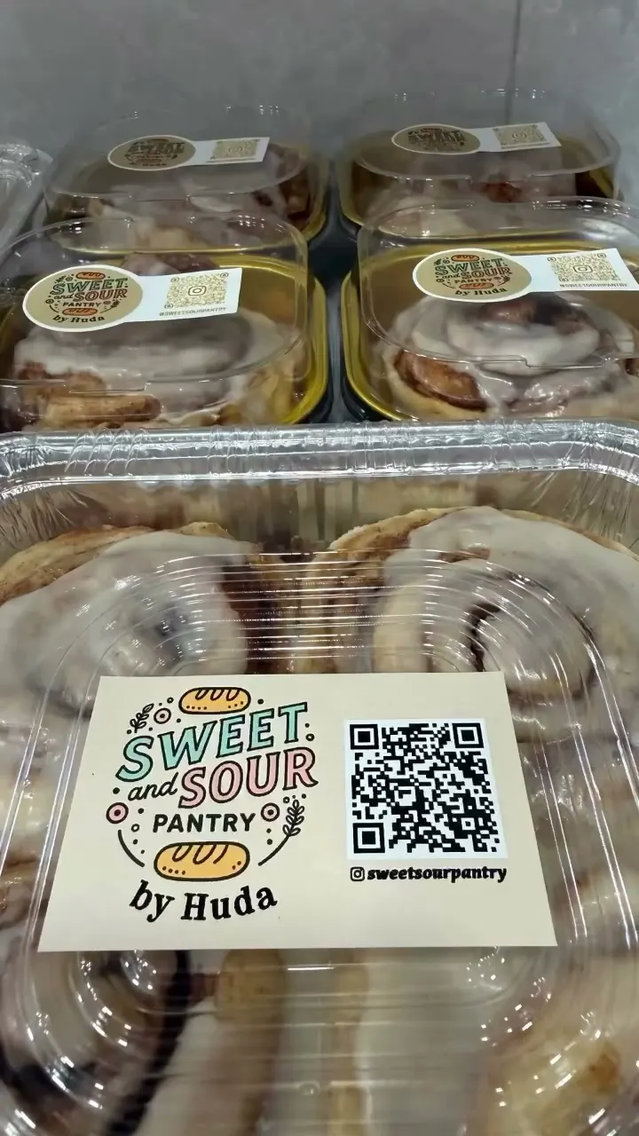 Boxed cinnamon rolls with a Sweet & Sour Pantry card